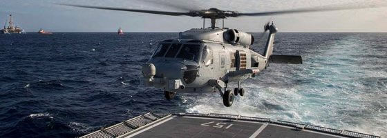 HMAS Perth's embarked MH60 Romeo helicopter prepares to conduct an air patrol