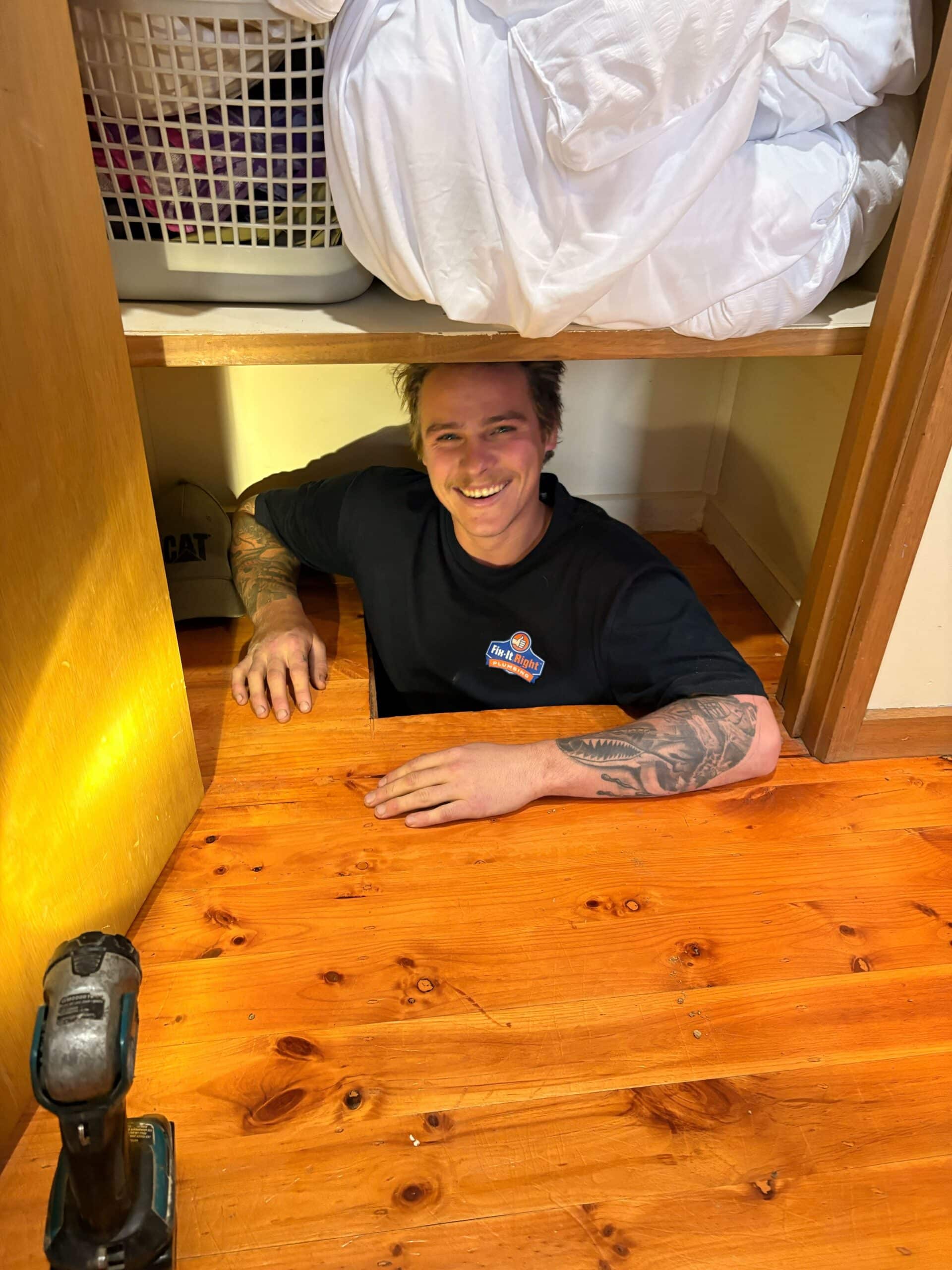 Fix-It Right Plumbing Expert Plumber in tight space